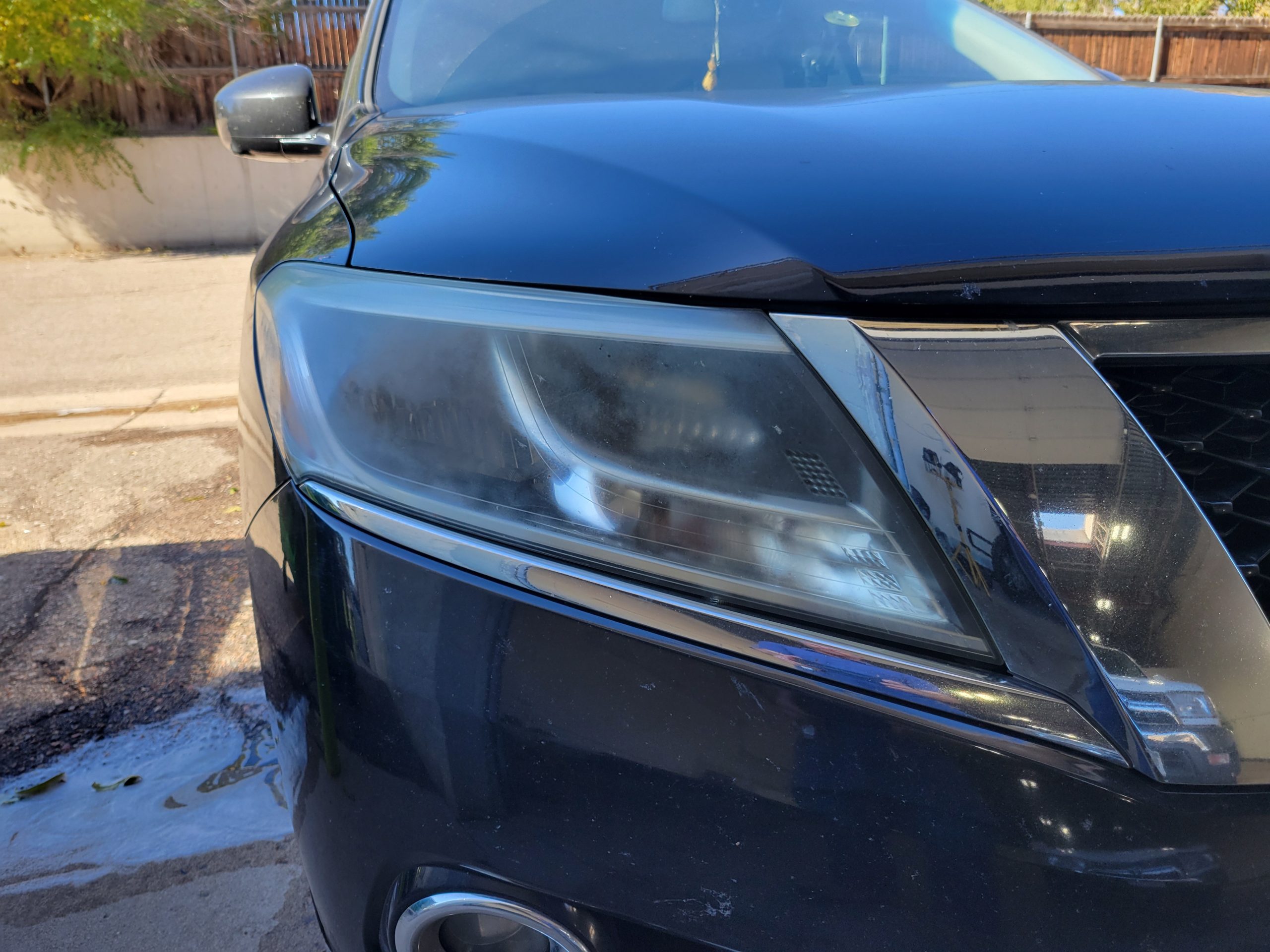 Before automobile headlight restoration